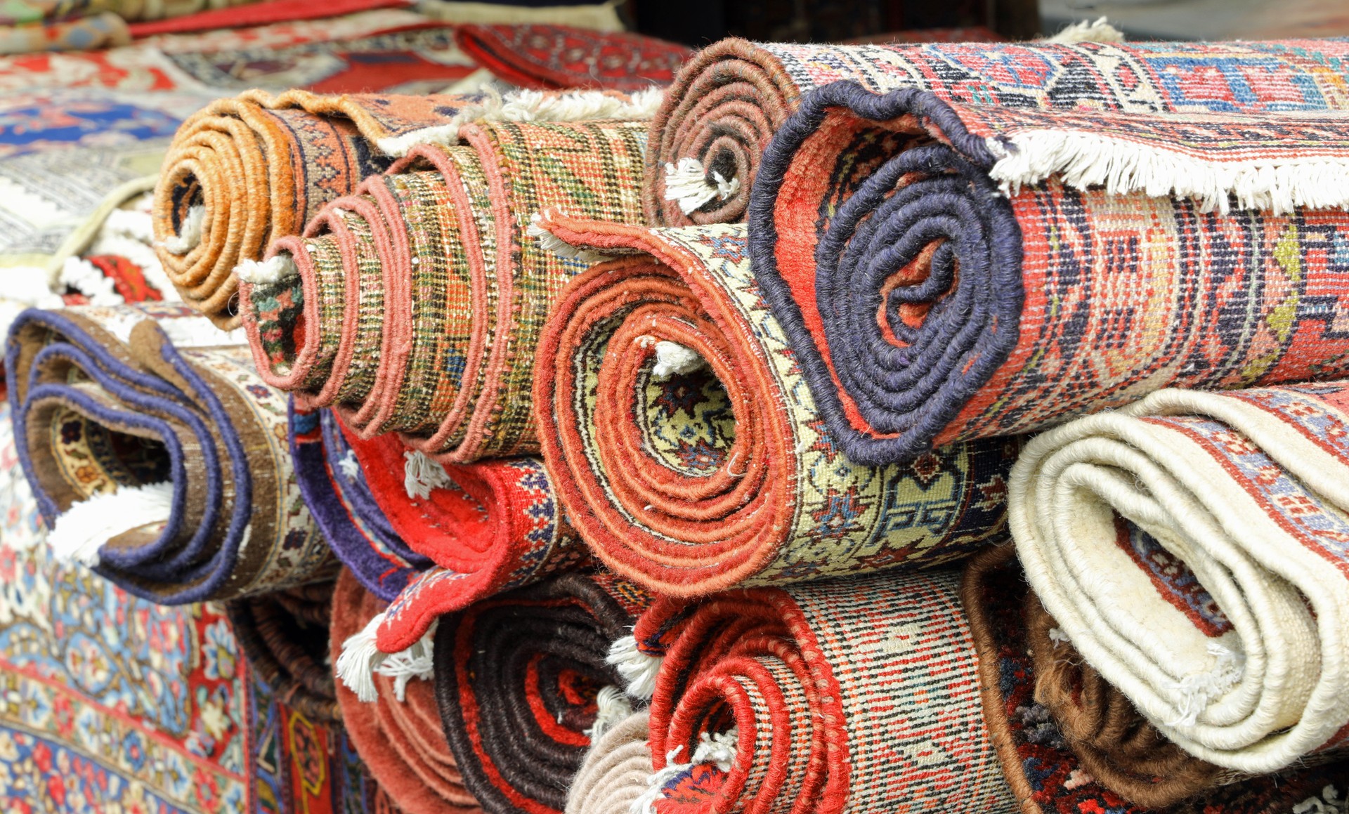 many rugs and carpets at stand