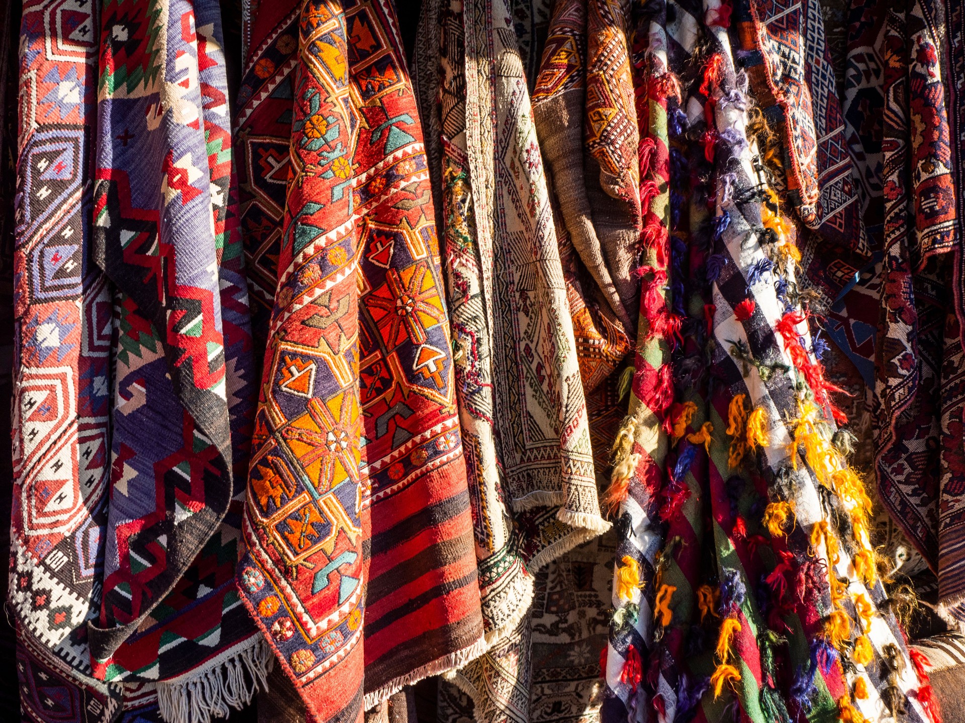 Turkish Rugs hanging for sale in Cappadocia