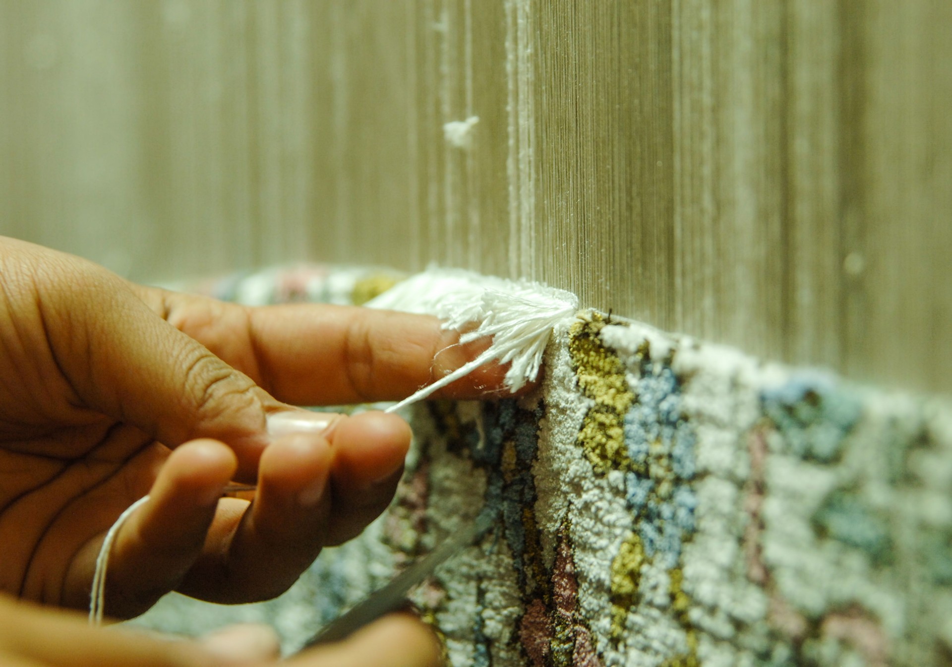production and weaving of carpets and fabrics
