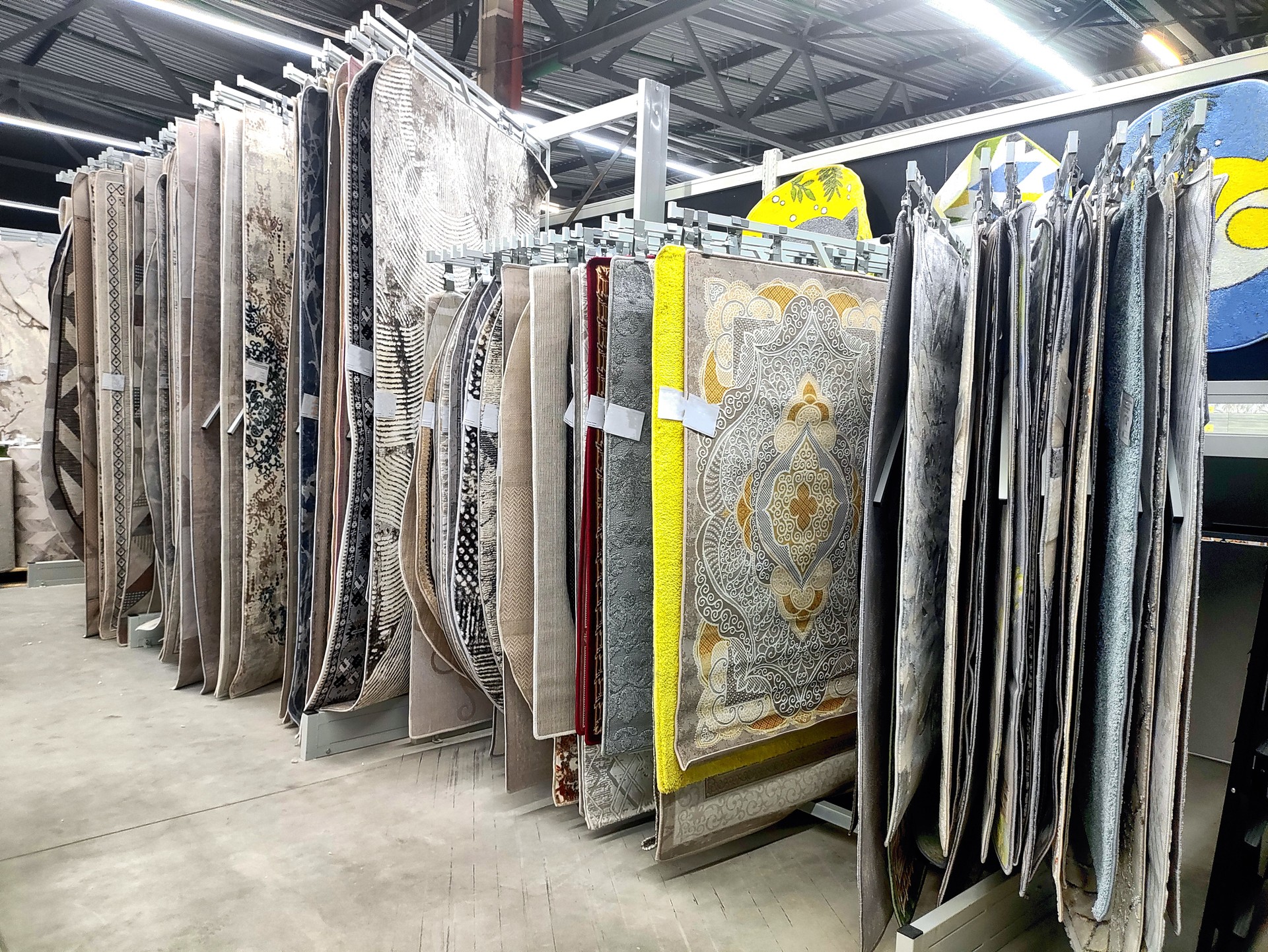 Sale of carpets and rugs in a carpet store, copy space for text